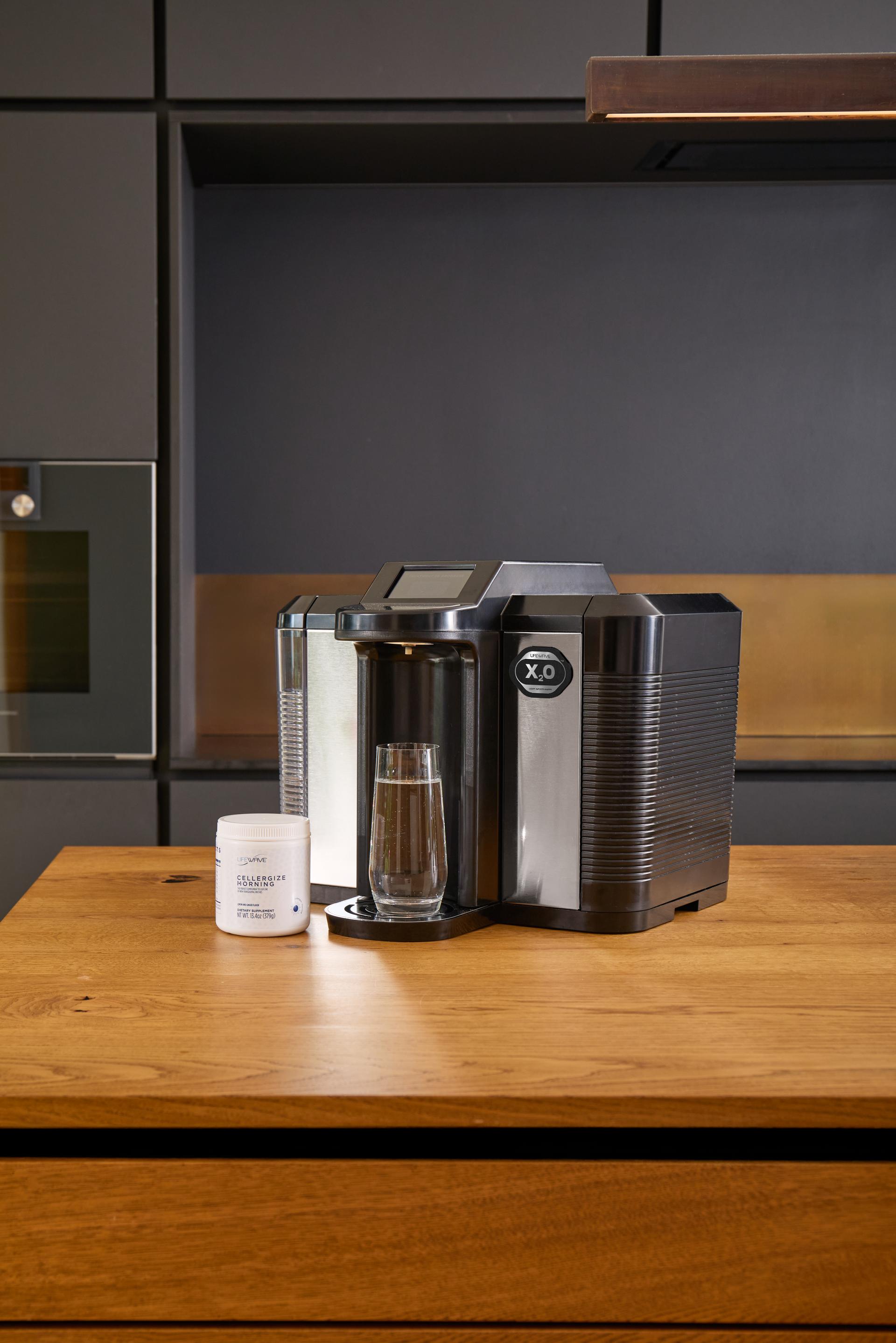 The LifeWave X2O Water Machine on a kitchen countertop